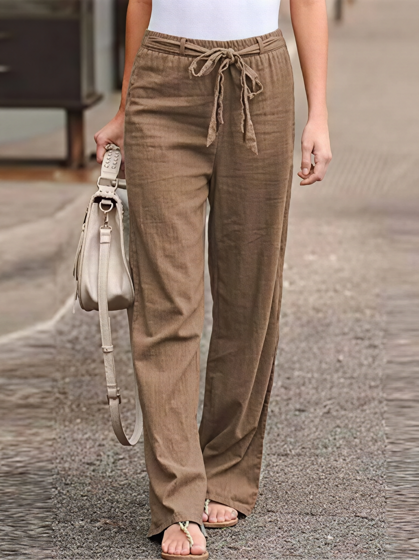 Women's pants with tie belt