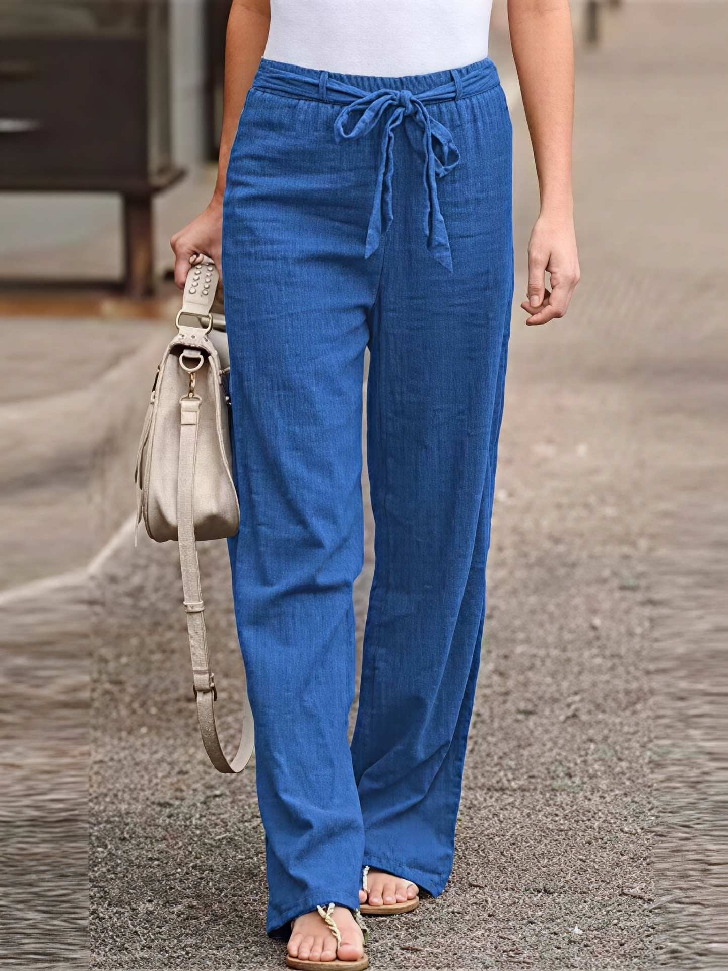 Women's pants with tie belt
