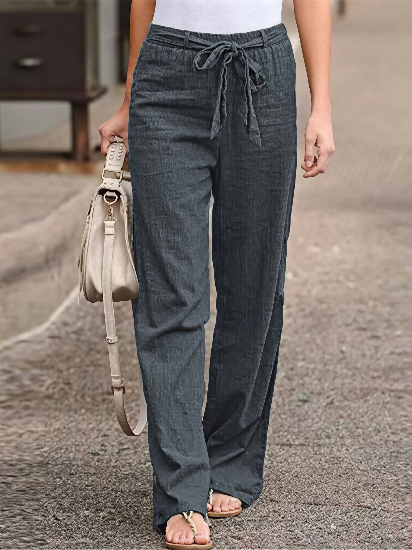 Women's pants with tie belt